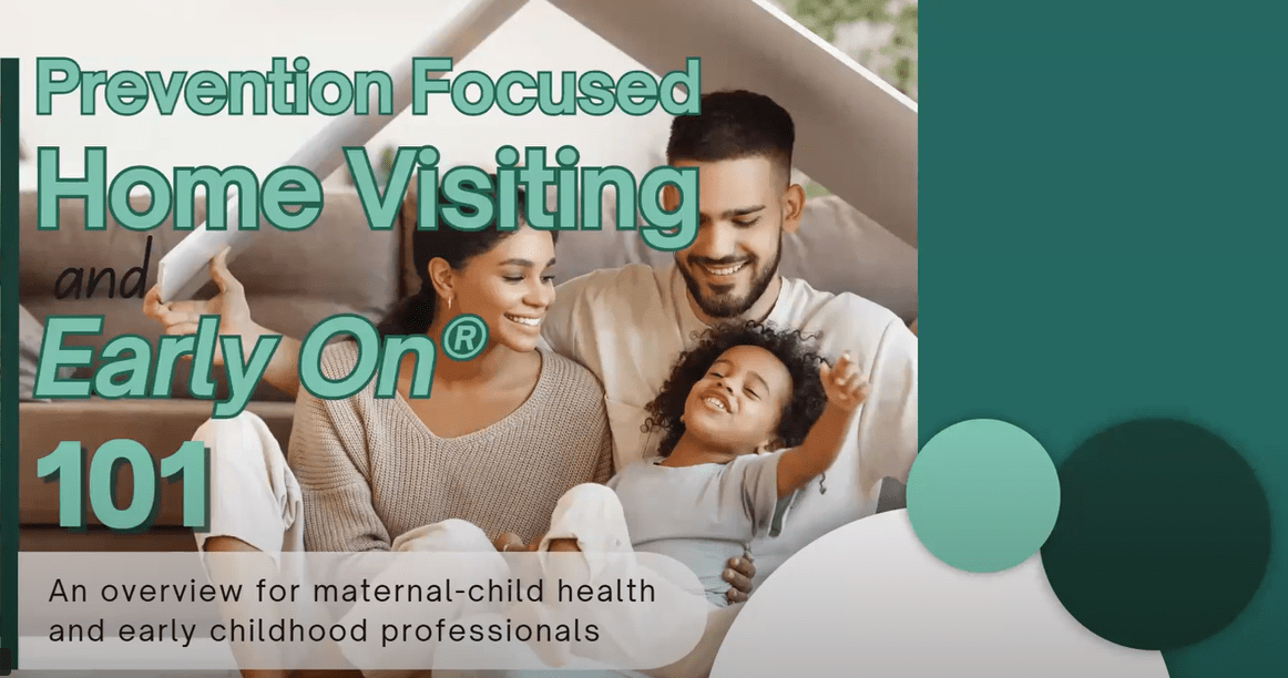 two caregivers smiling with a child