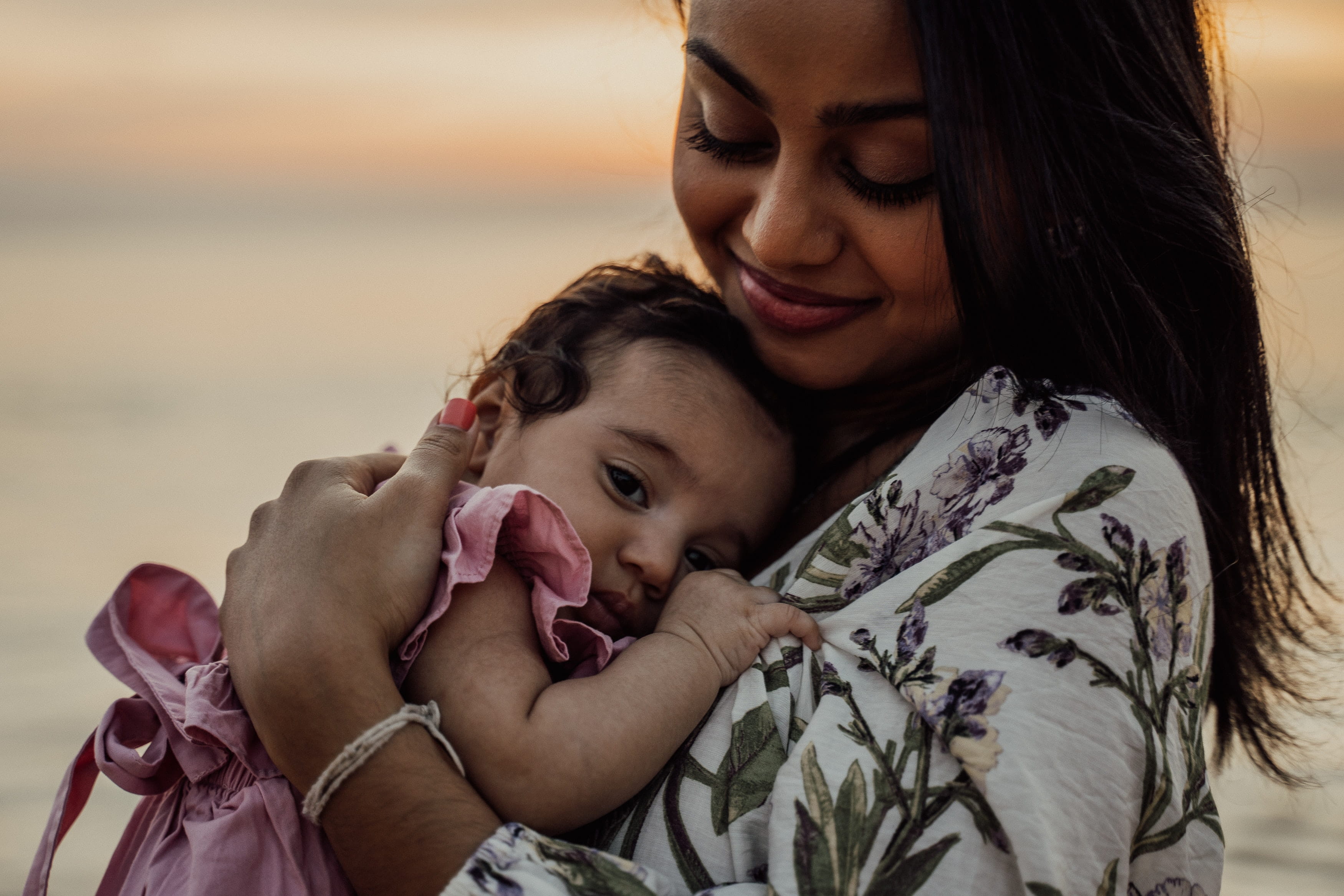 mom embracing baby