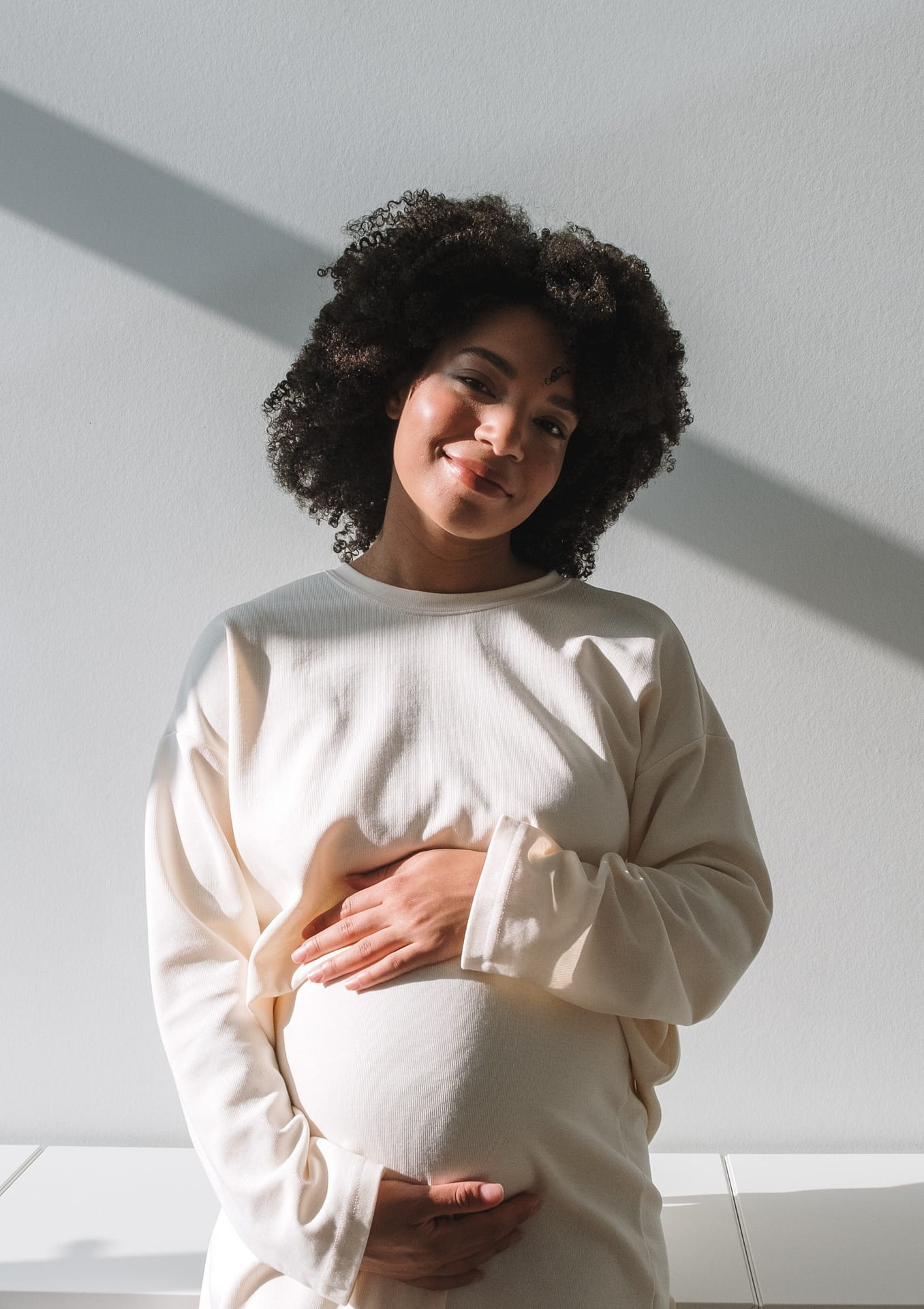 pregnant person smiling