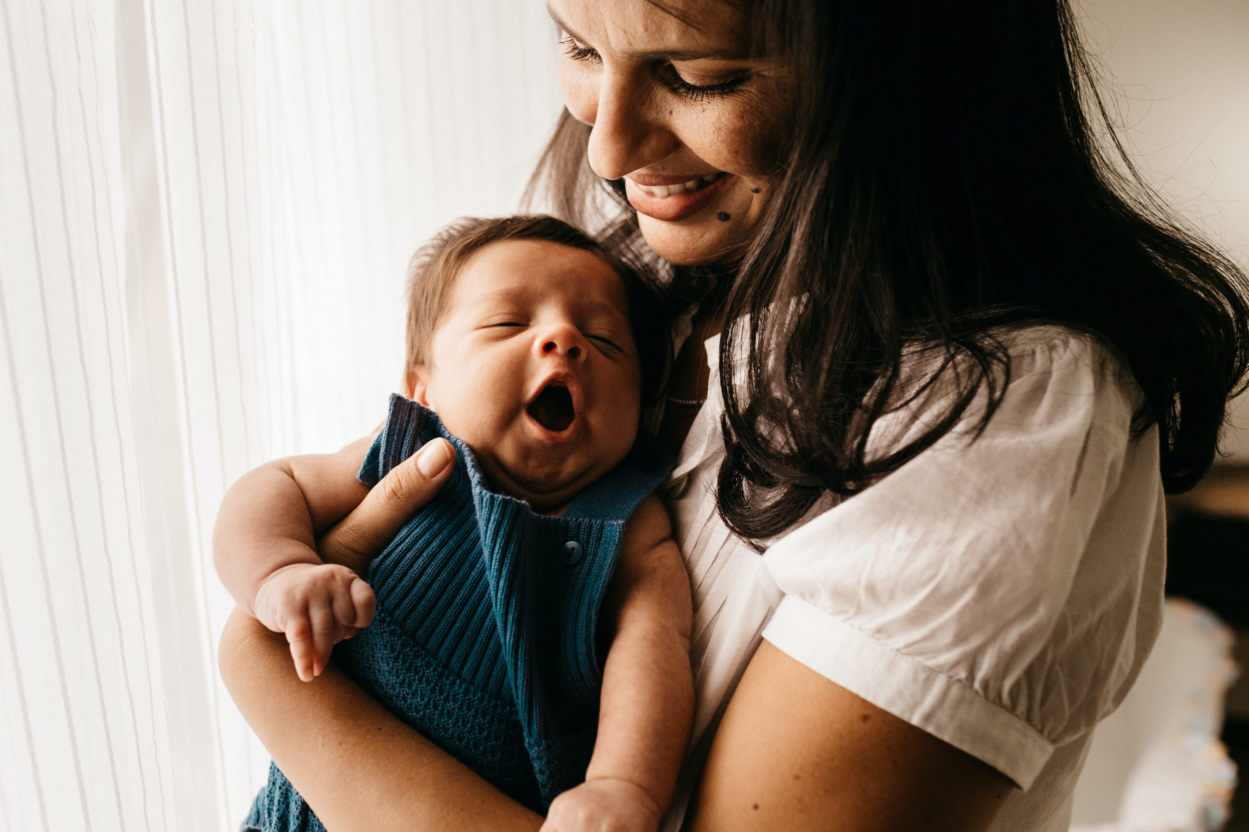 caregiver holding baby