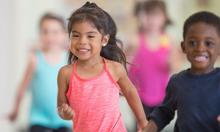 girl and boy running