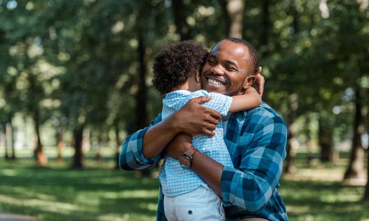 dad hugging child