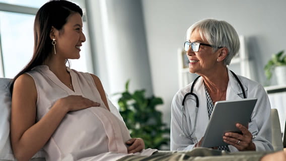 expectant mom talking to doctor