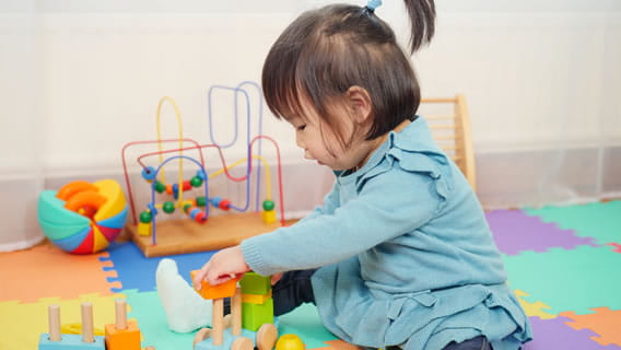 baby playing with toys