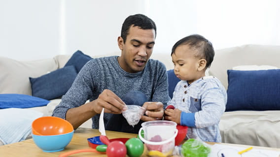 a provider helping child with experiment