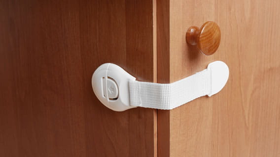 cabinet with safety closures