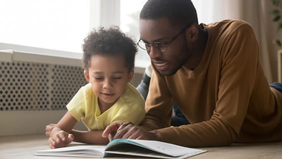Father reading to child