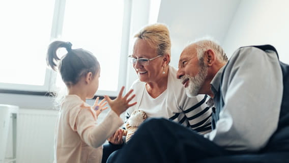 grandparents talking to grandchild