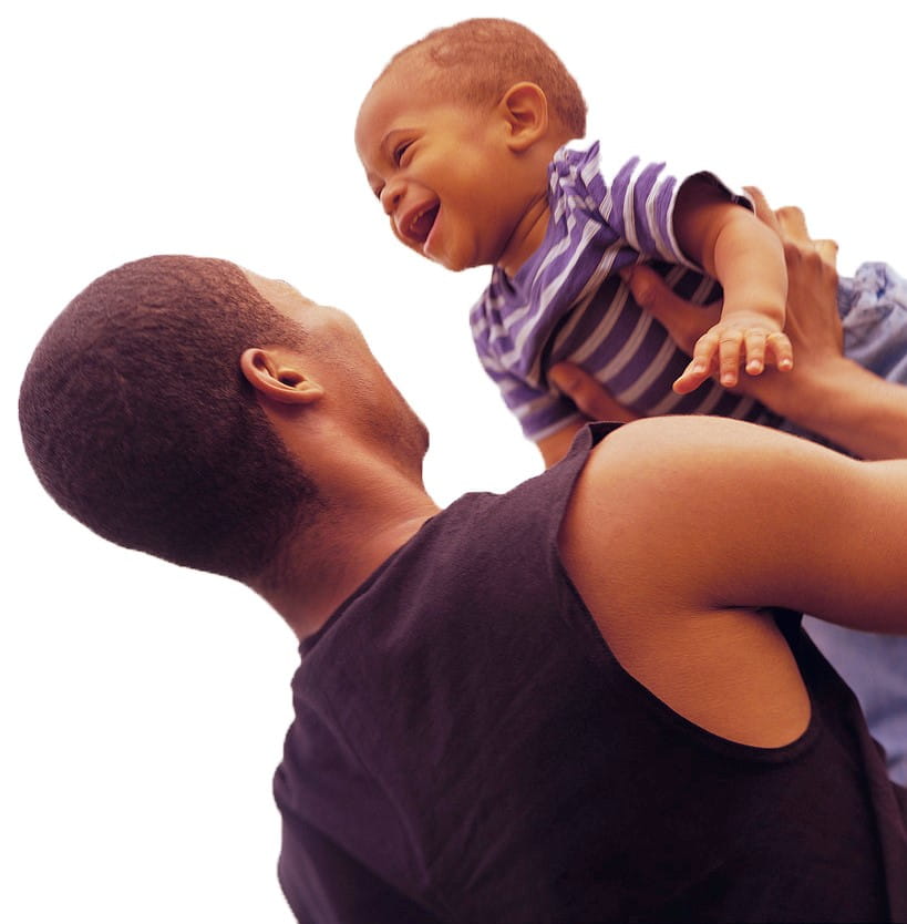 African American dad holding baby in air