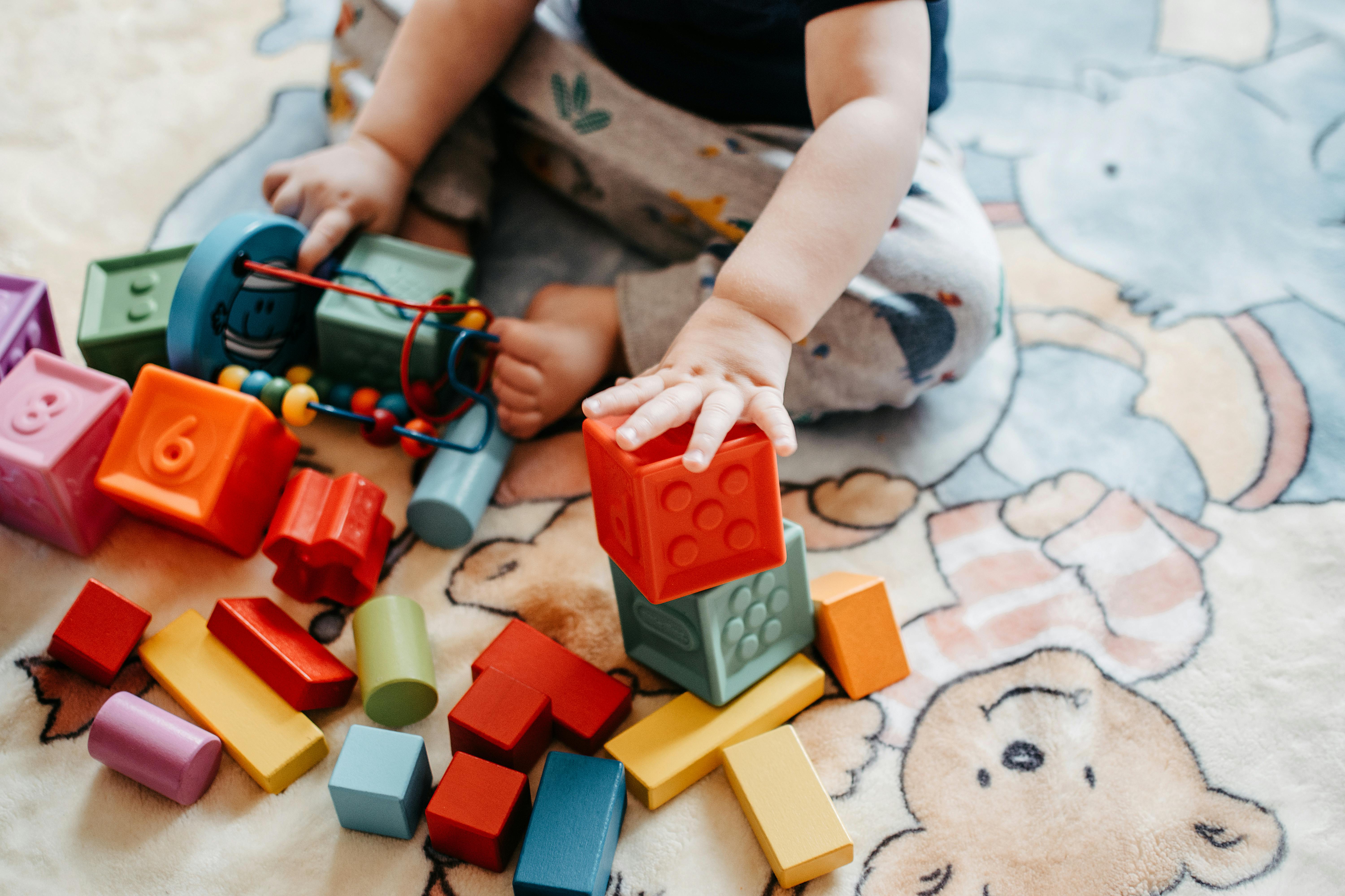 baby playing with blocks