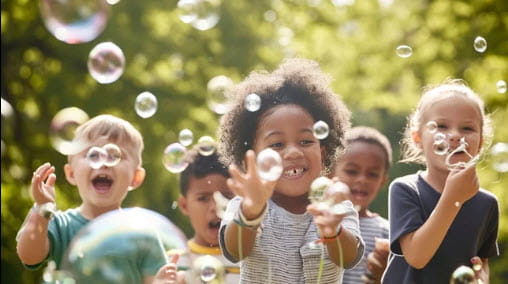 kids playing with bubbles