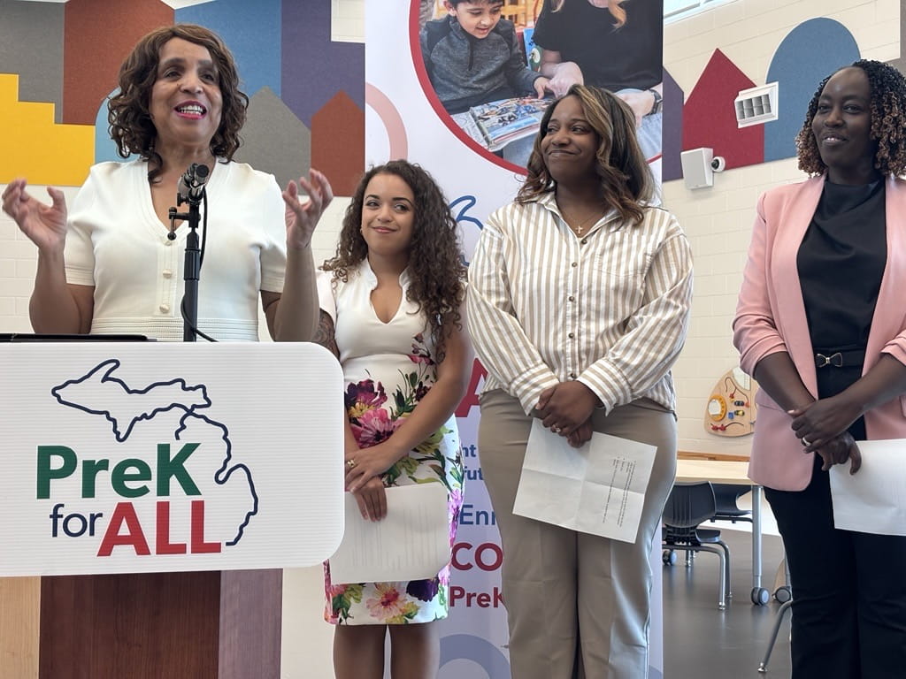 Dr. Beverly Walker-Griffea speaking at a PreK for All press event with 3 woman standing behind her