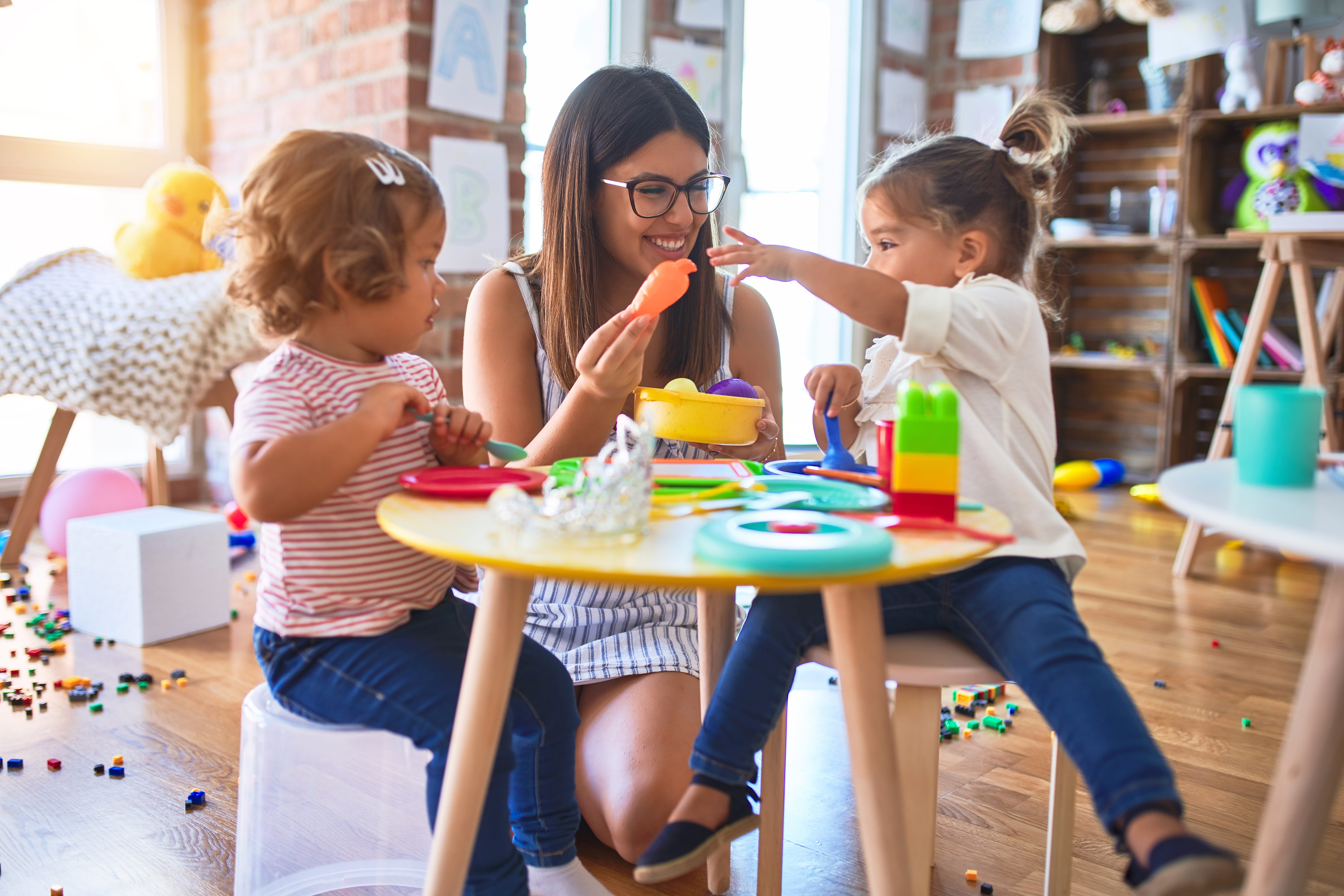Teacher and Toddlers in Classroom