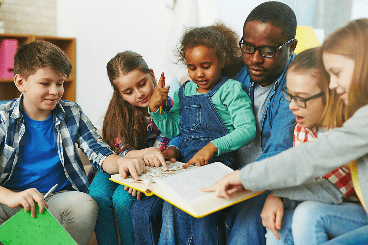 Teacher and kids reading