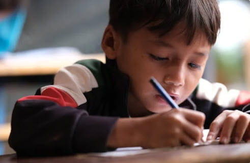 boy writing