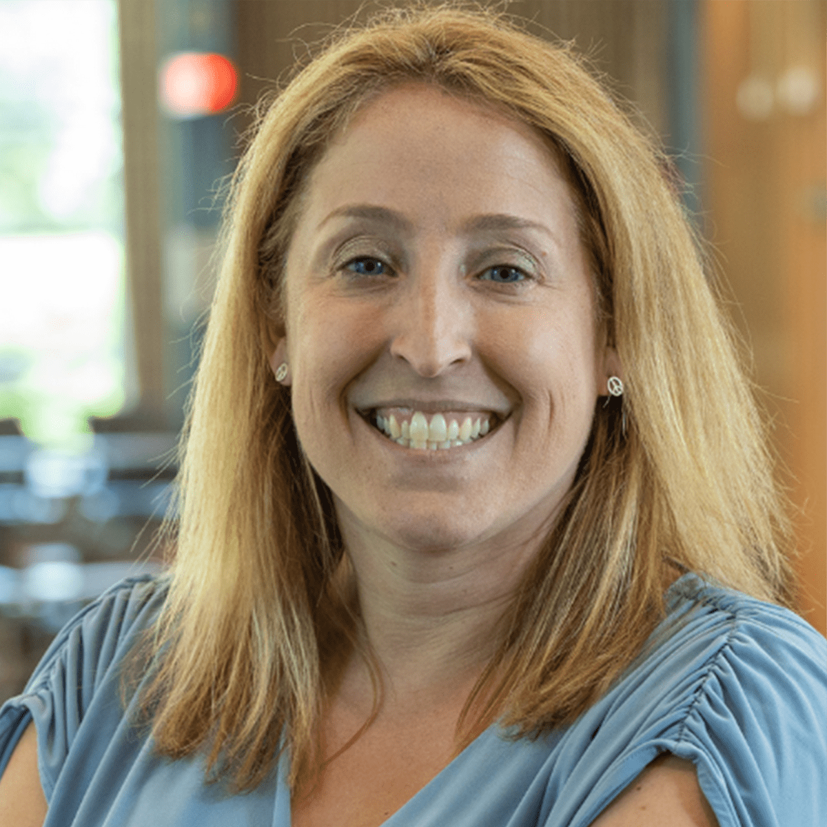 Headshot of Kelley Cusmano