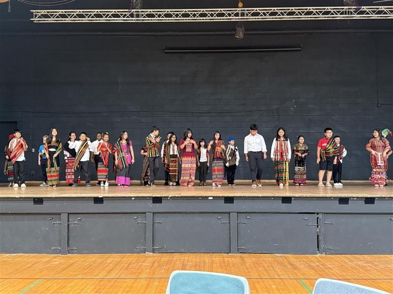 Students in the THRIVE Summer Youth Program showcase traditional Burmese attire during today's celebration event.