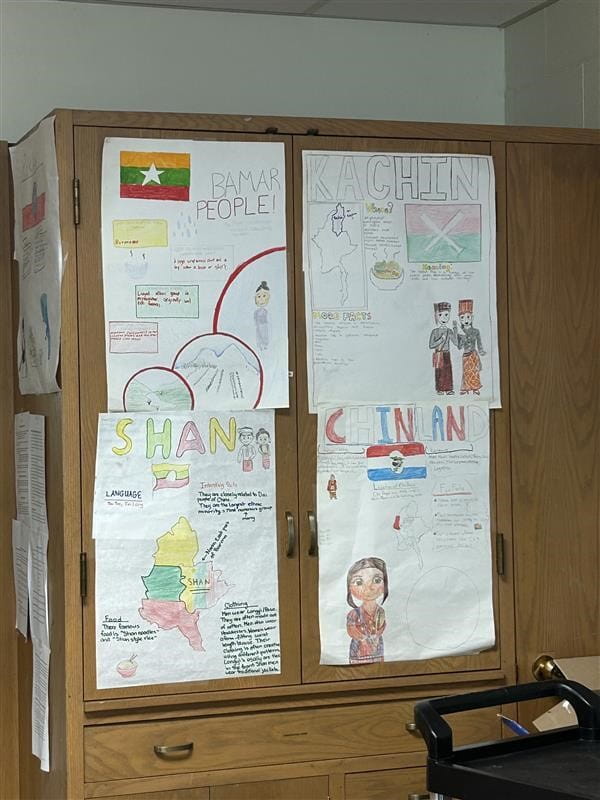 Classroom display at The Burma Center highlights culture-focused projects.