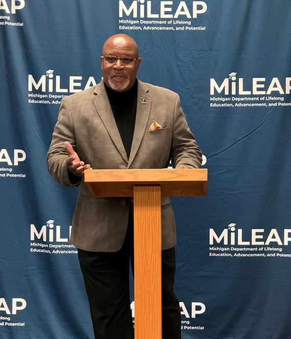 Rawlan Lillard III speaking at a podium