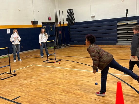 Students participate in a ladder toss activity during the Fall in Love with Bright Futures event.