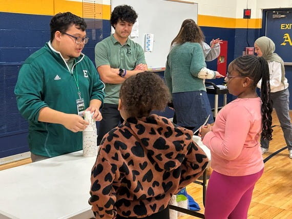 Students participate in a two-player buzzer learning challenge led by EMU program leaders during the Fall in Love with Bright Futures event.