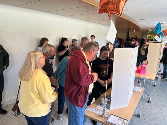 Families engaged in a 21st Century Community Learning Centers event with NASA.