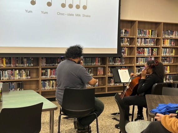 Student Ja'Niyah McCrae participates in after-school music program.