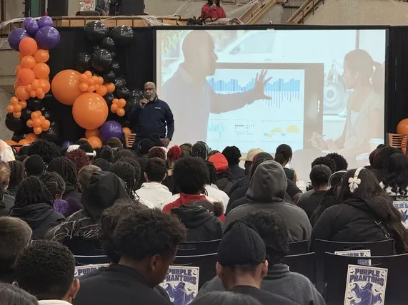 Deputy director of MiLEAP's Office of Strategic Talent Preparation, Jason Wilson, speaks to students about how the state of Michigan is supporting their lifelong learning success