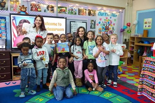 Governor Whitmer at PreK for All press event Gov. Whitmer sits on the carpet with students in a preschool classroom at Henry Doerr Early Childhood Center in Saginaw