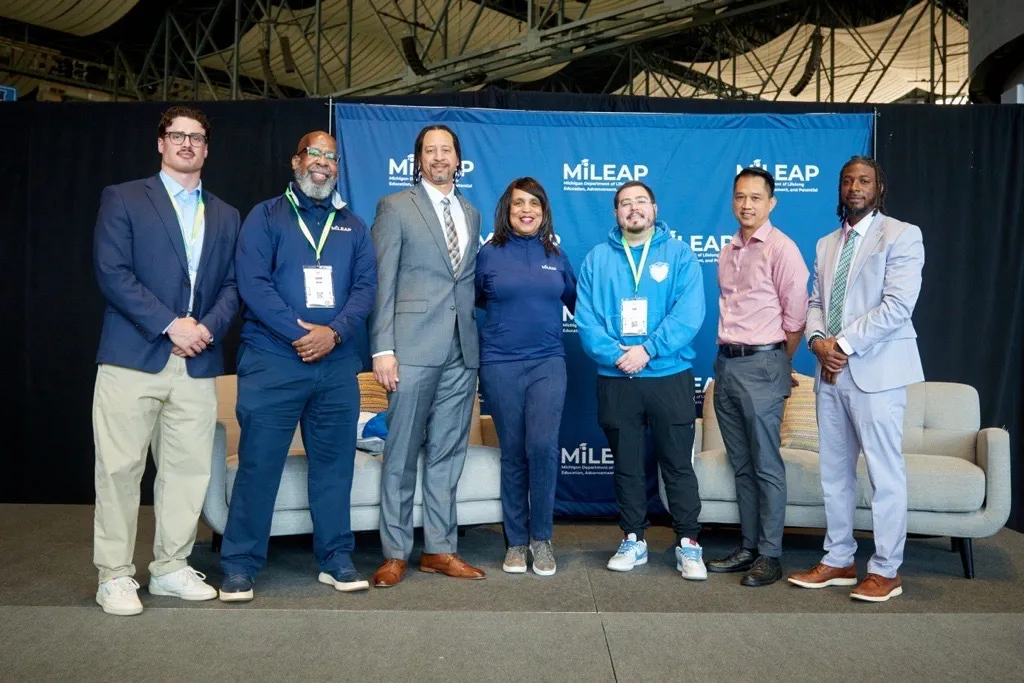 Left to Right: Sam Edwards, former Michigan State University football player; Jason Wilson, deputy director of strategic talent preparation at MiLEAP; Brandon Keyes, former Michigan Reconnect graduate and manager of the Equal Opportunity Hub at the University of Michigan's Ross School of Business; Dr. Beverly Walker-Griffea, MiLEAP director; Rob Pyle, registered nurse at Henry Ford St. John Hospital; Rod Reyes, program coordinator for early childhood education at Mott Community College; Derrick King, director of Upward Bound at Muskegon Community College