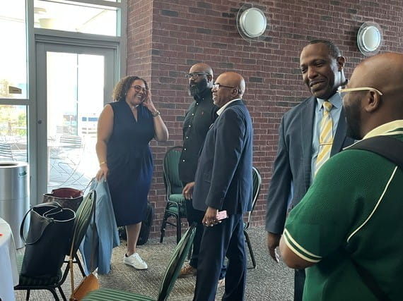 Attendees connect during the Men in Motion Summit, an event designed to strengthen collaboration and expand pathways to education, training, and economic opportunity for Michigan men.