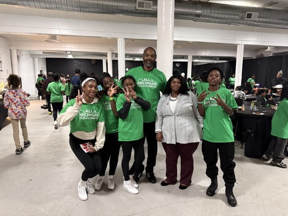 Students pose with Curtis Blackwell II, founder and president of Sound Mind Sound Body Foundation, and MiLEAP staff member Deondra Ramsey during the Lights On Afterschool event in Detroit. Students pose with Curtis Blackwell II, founder and president of Sound Mind Sound Body Foundation, and MiLEAP staff member Deondra Ramsey during the Lights On Afterschool event in Detroit.