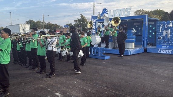 The Levey Middle School band from Southfield performs in front of the co-branded MiLEAP and Detroit Lions Mobile Marketing Unit during the Lights On After School celebration in Detroit