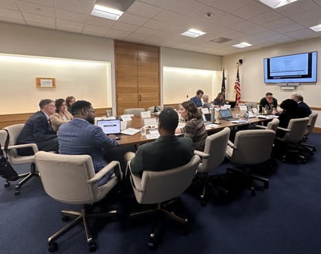 ACTS Council Members sitting at a large table