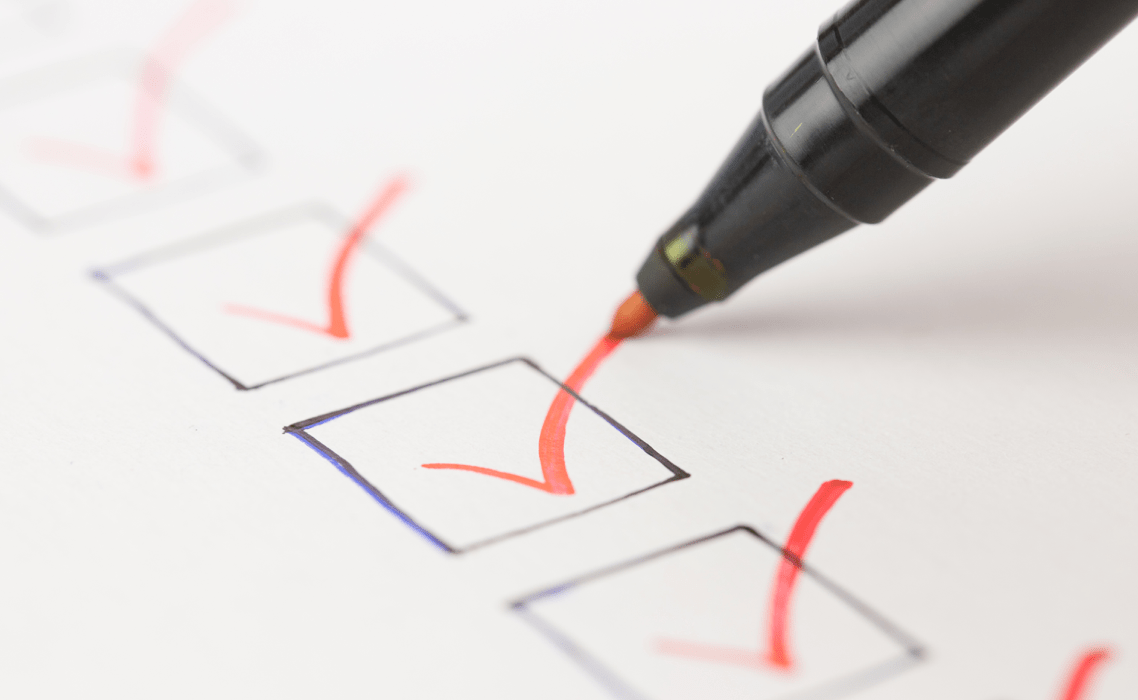 Person ticking checkboxes