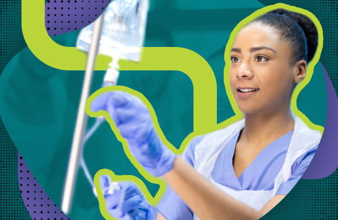 A medical student practicing administering an IV.