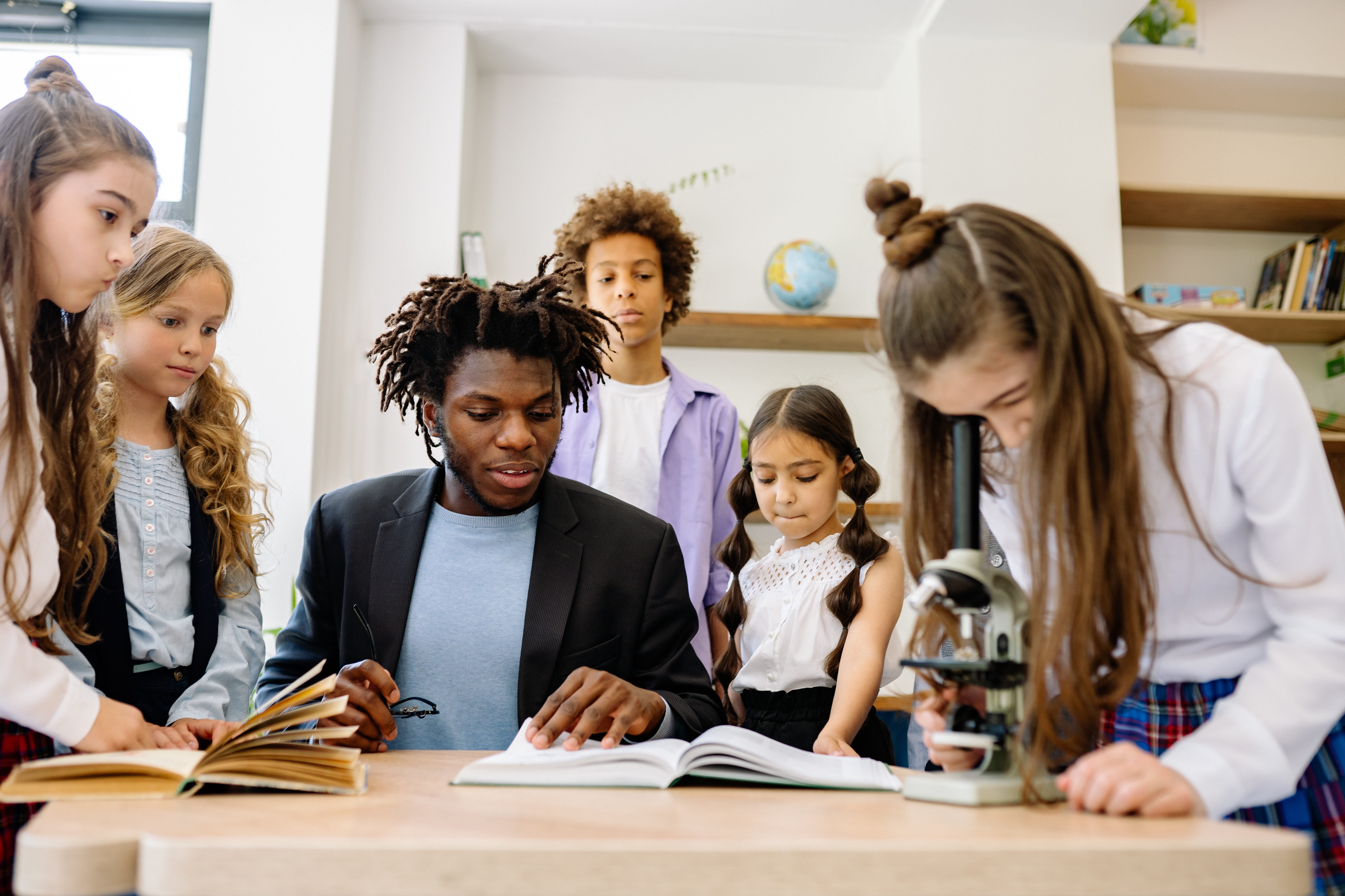 A teacher working with his students.