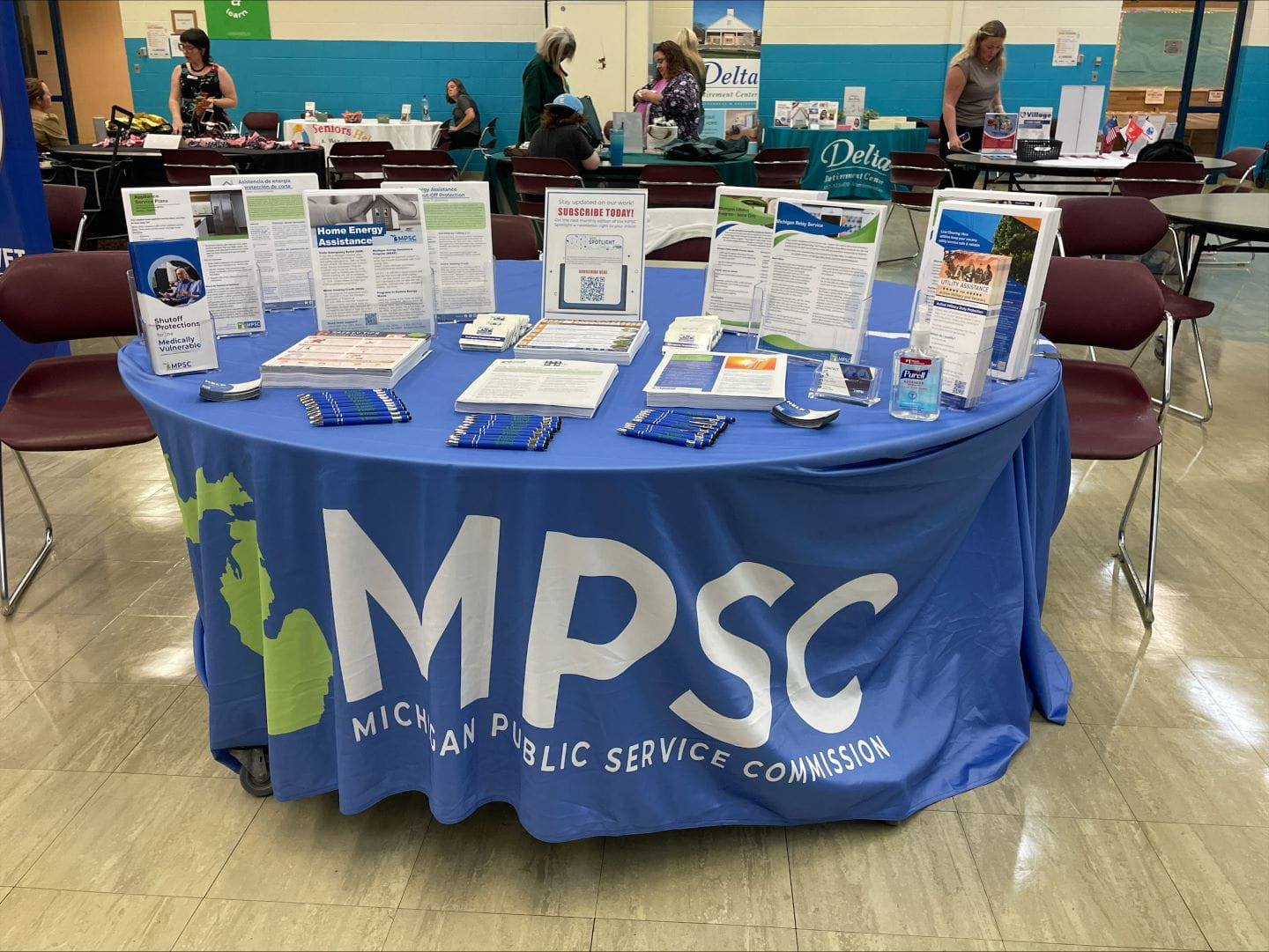 MPSC table with consumer tip sheets organized on the top