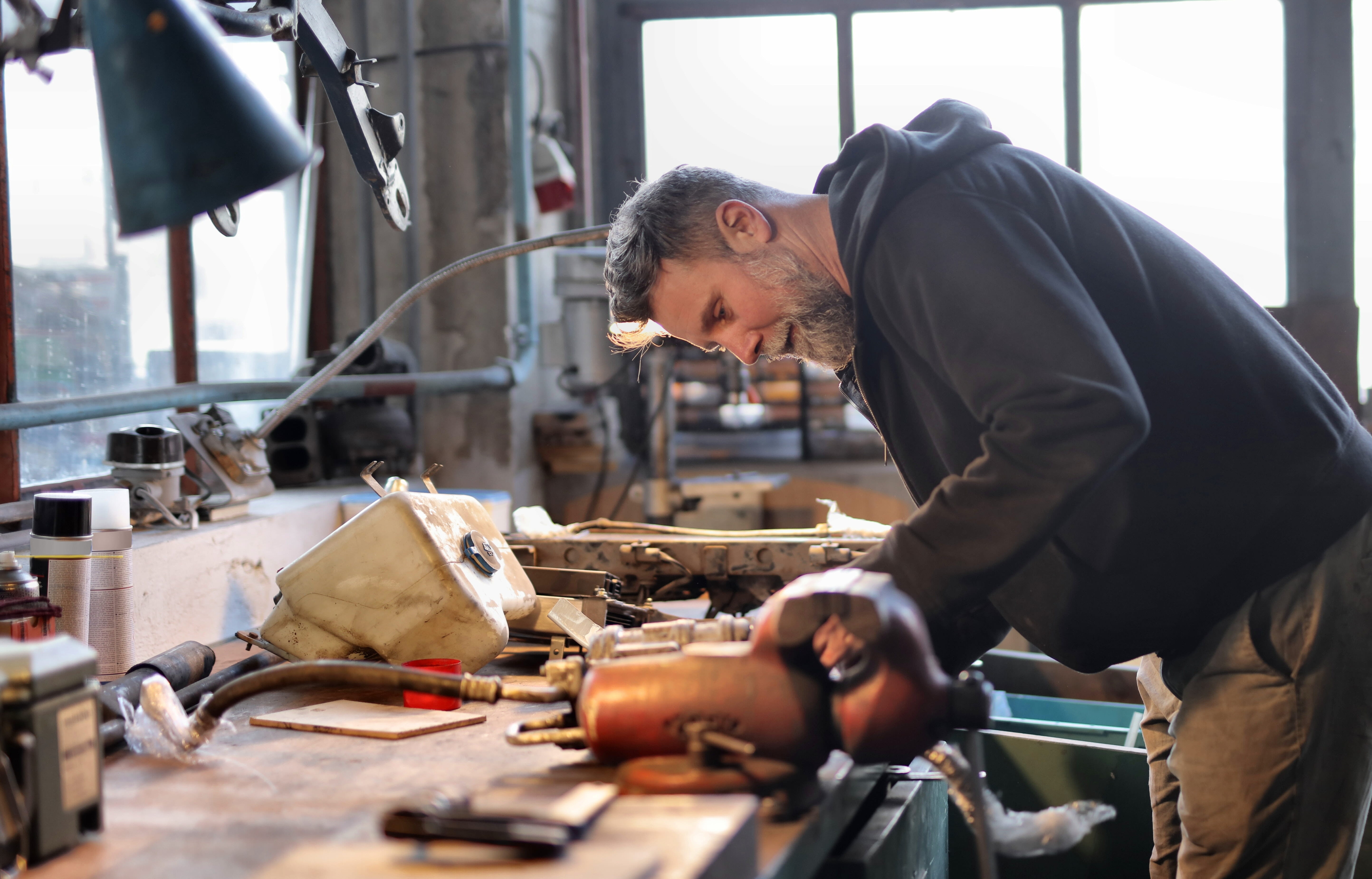 Mechanic repairing in garage