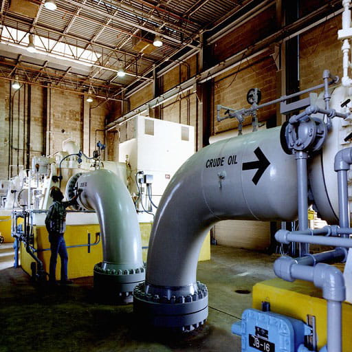 Pipes with crude oil arrow
