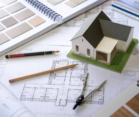 blueprints and model of a house