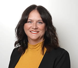 Barbara Deering in front of a white background