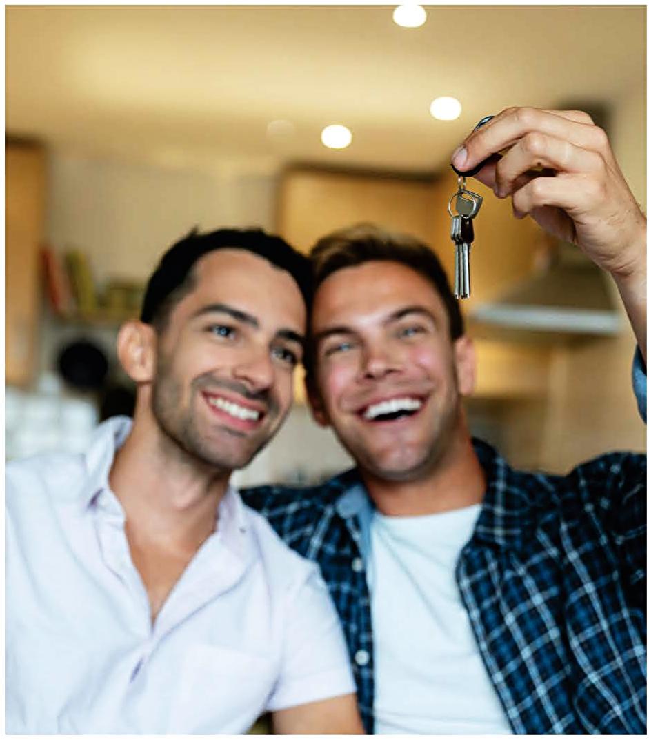 two men holding keys
