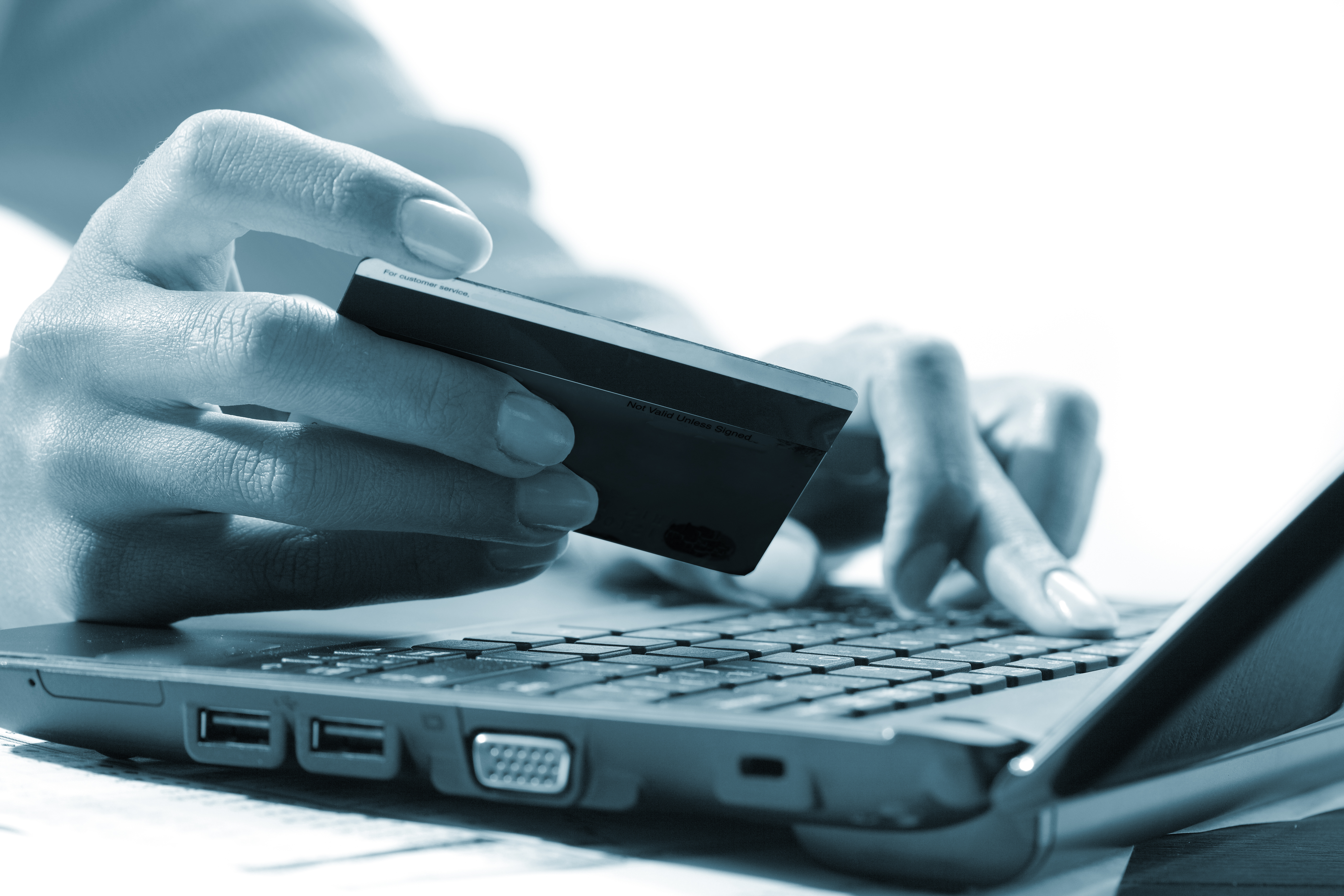 hands at laptop computer