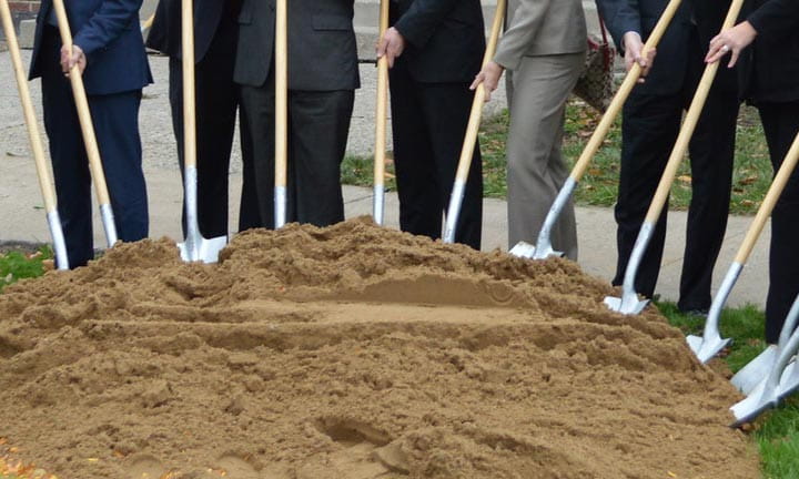 developers breaking ground with shovels