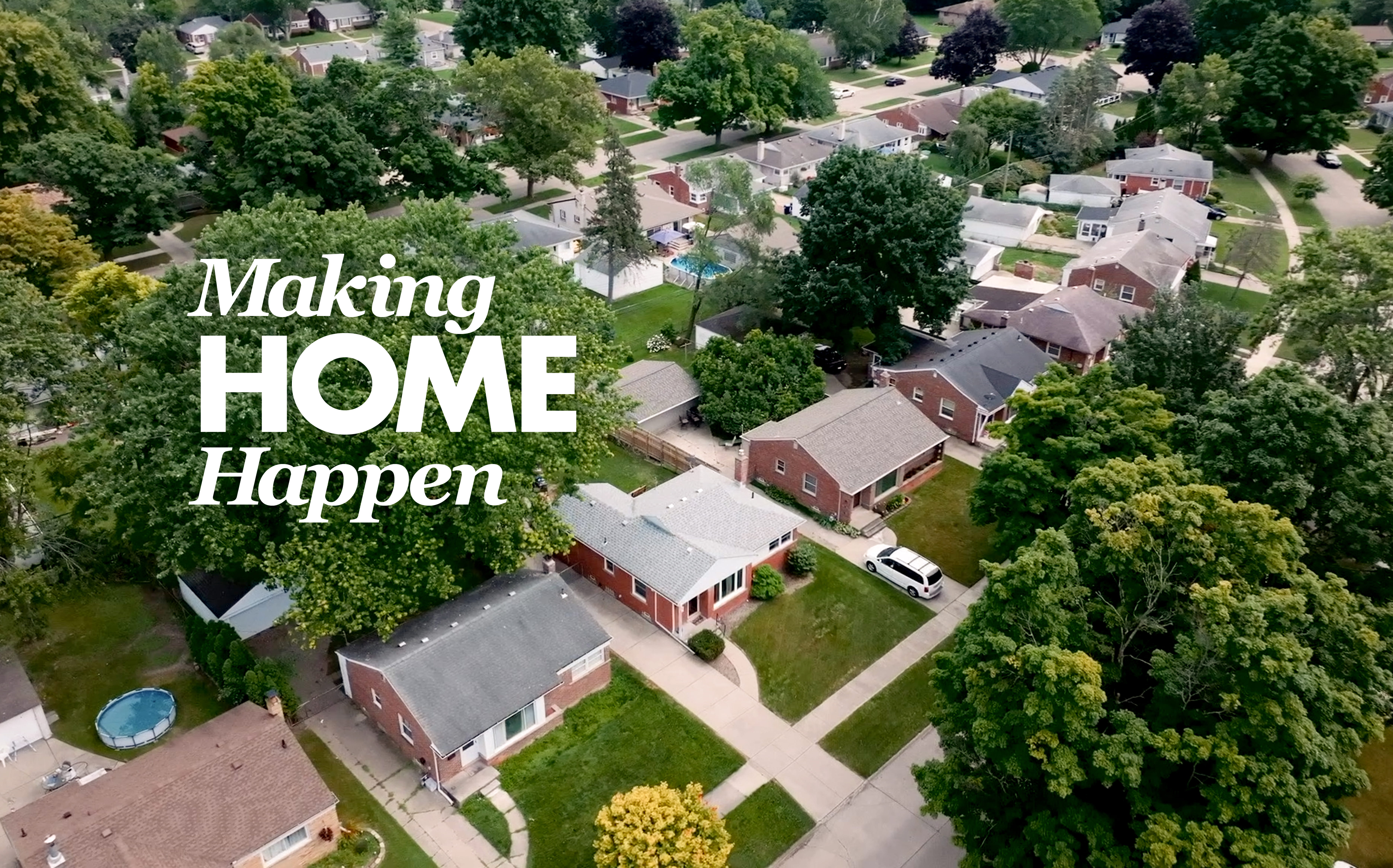 Aerial view of MI neighborhood with "Making Home Happen" text