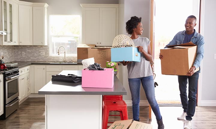 young couple moving in