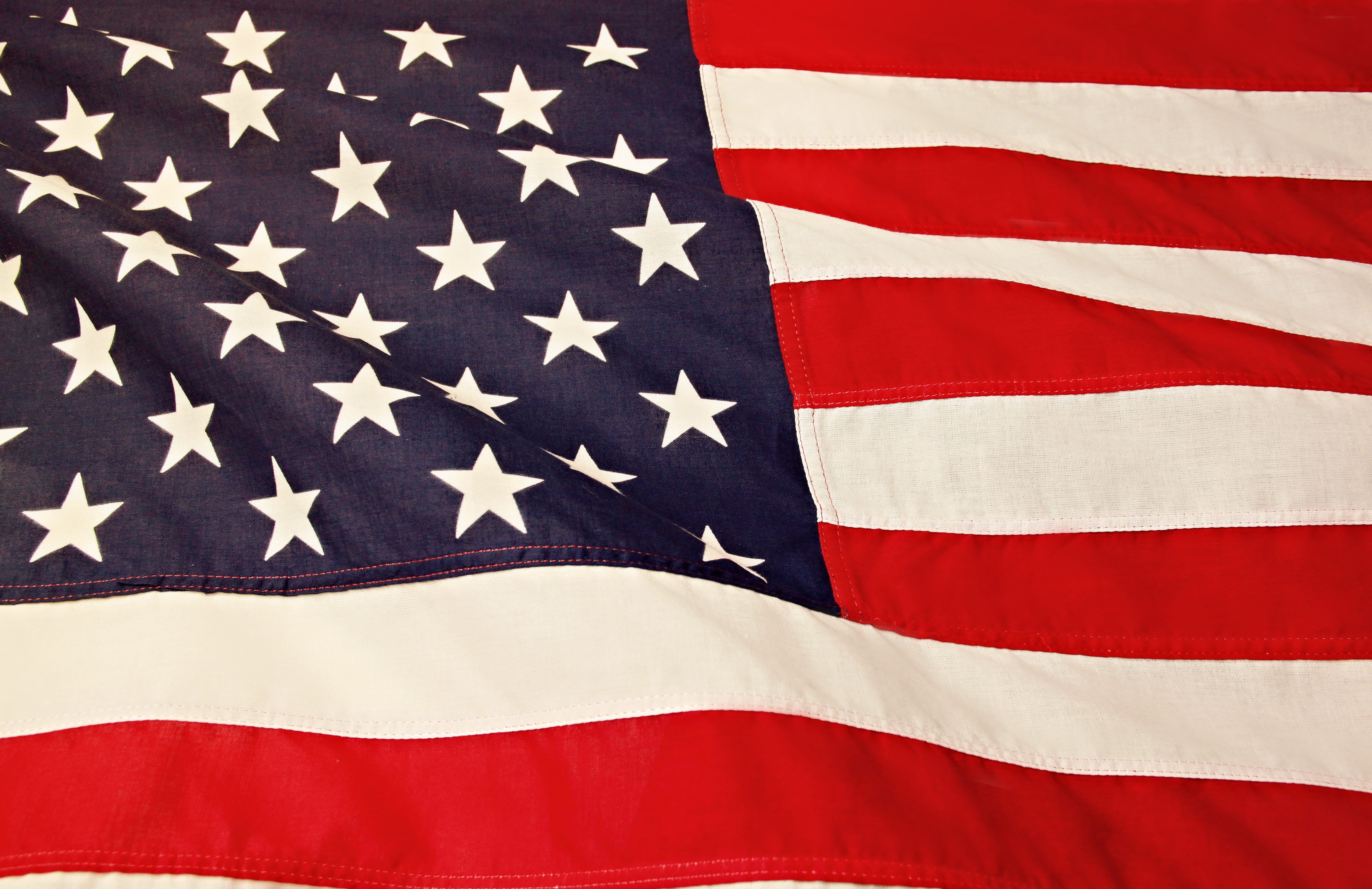 A close-up of a waving American flag.