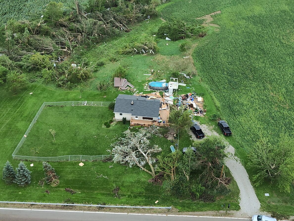 Aerial view of a tornado-damaged house