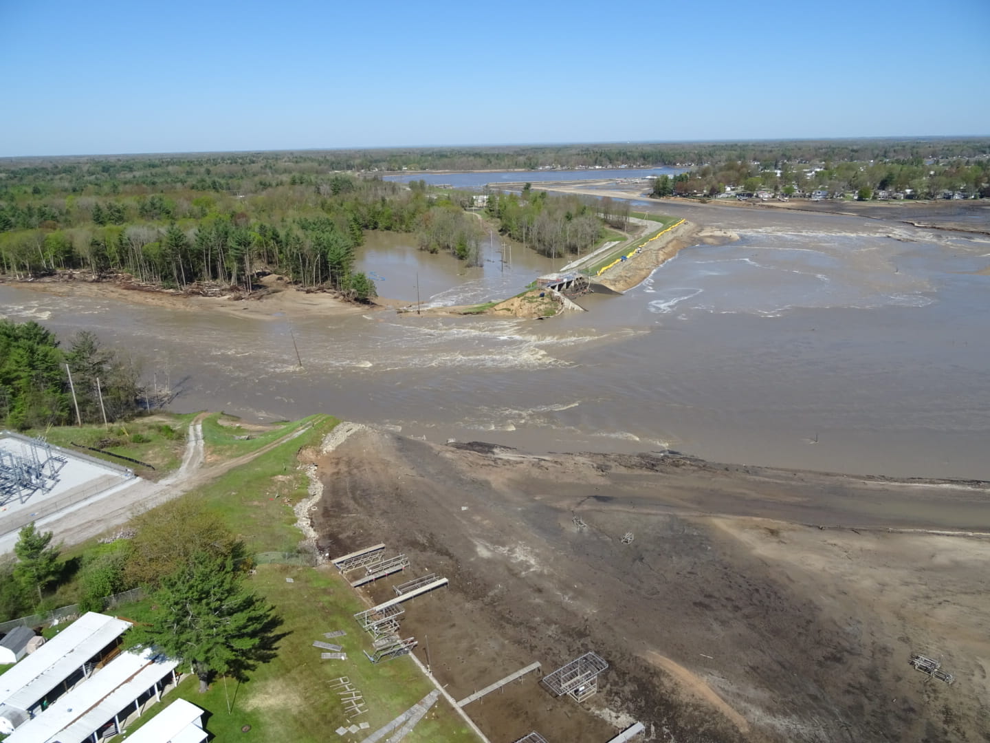 An aerial view of flooding caused by a broken dam.
